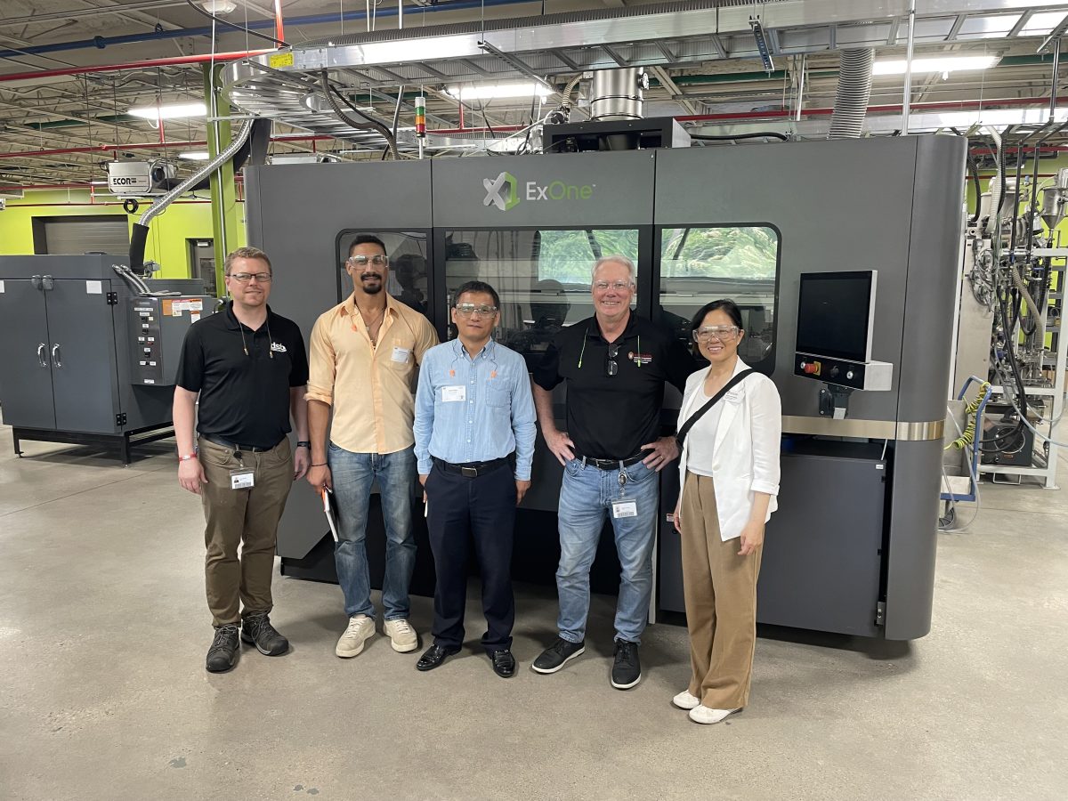 UW faculty team visiting a company