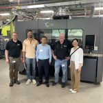 UW faculty team visiting a company